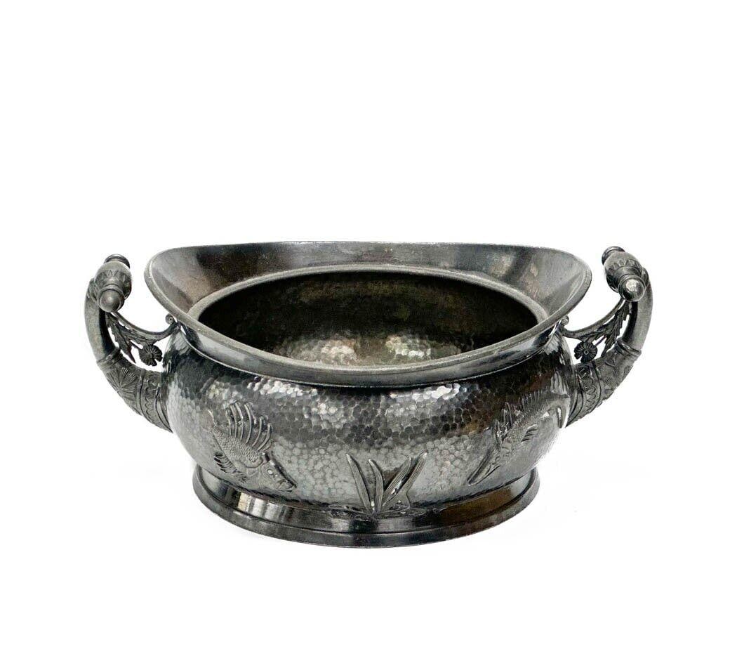 Meriden Britannia Quadruple Aesthetic Silver Plate Twin Handled Bowl Fish c.1920: Meriden Aesthetic Silver Plate Twin Handled Bowl, circa 1920. Twin handled bowl with a hand hammered finish, raised fish decoration to the sides. Underside with Meriden marks. Weight: Approx. 2 lbs Me