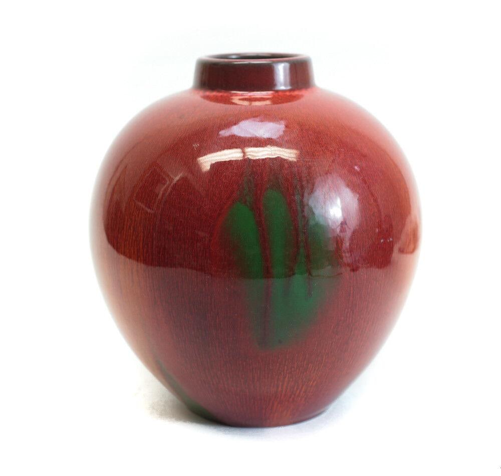 Chinese Red Flambe Glaze Hare's Fur Vase, swaths of bright green and intense red: Chinese Red Flambe Glaze Hare's Fur Vase, swaths of bright green and intense red glaze, signed on the base (indiscernable). 3Lbs Measurements: Approx. 7" height x 7" diamete Condition: Very good condi