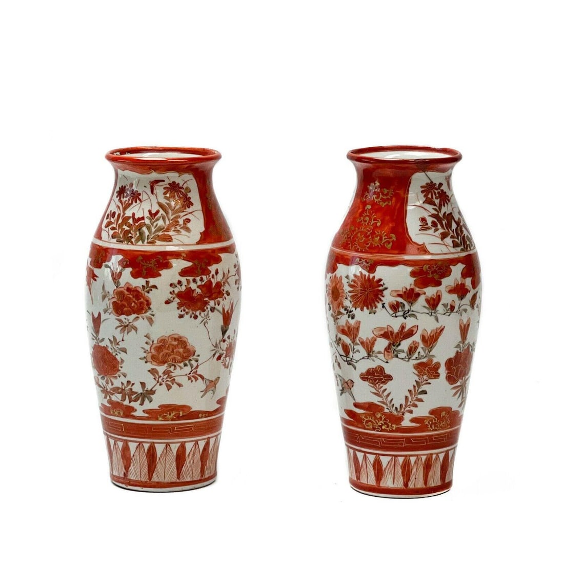 Pair Japanese Kutani Hand Painted Porcelain Vases Red Florals Birds Gilt Accents: Pair Japanese Kutani hand painted porcelain vases. A rust red ground to the edges, panels to the body depicting florals and birds. Gilt accents, gilt decoration to the neck and edges of vases. Japanes