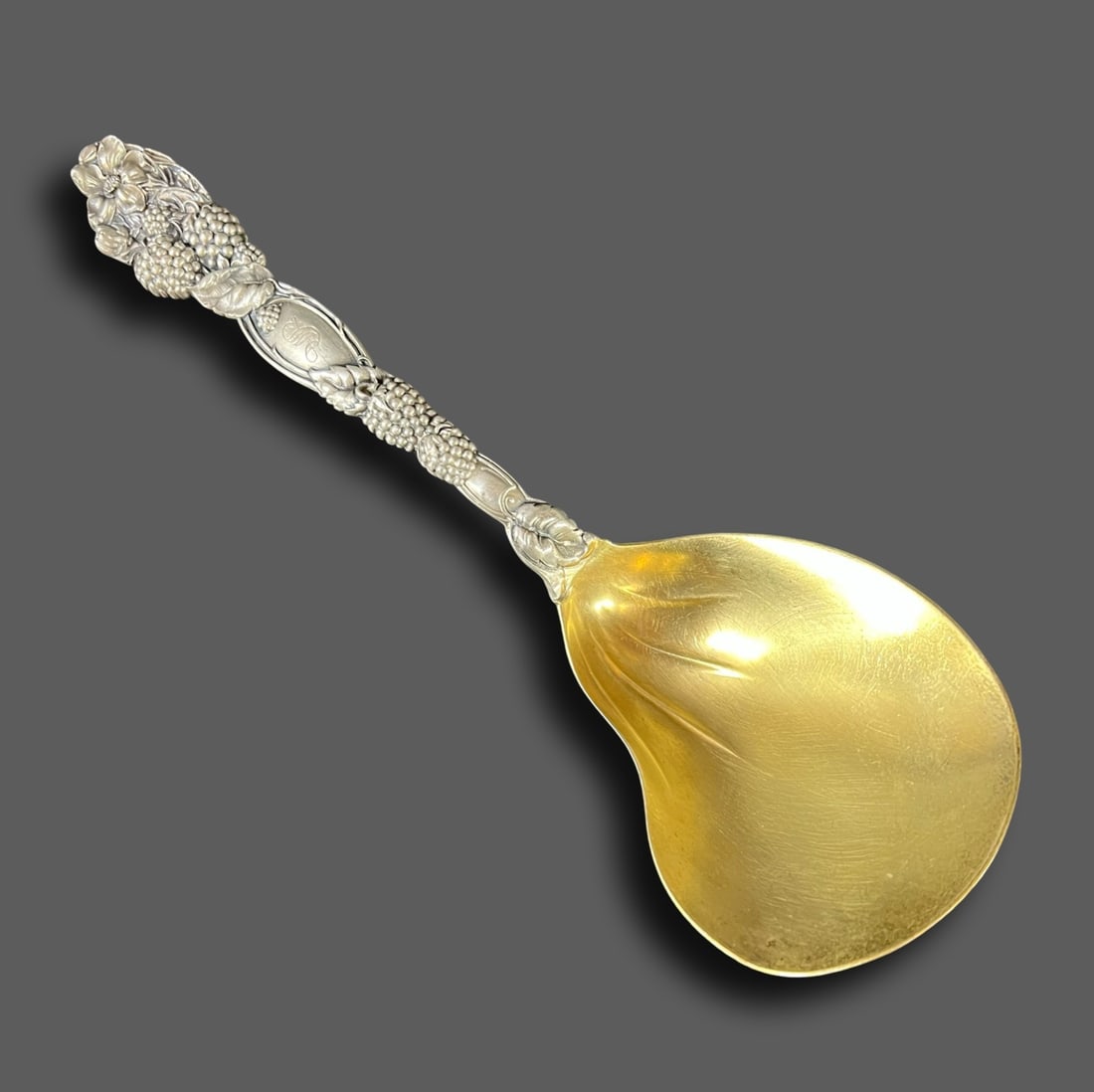 Tiffany & Co Sterling Silver BLACKBERRY pattern c1875 Gilt Serving Spoon: Tiffany & Co Sterling Silver BLACKBERRY pattern c1875 Serving Spoon w/ oyster shaped bowl, parcel gilt. Makers mark on the reverse side, monogrammed "S" Measurements: Approx. 123 grams (3.954 ozt); sp
