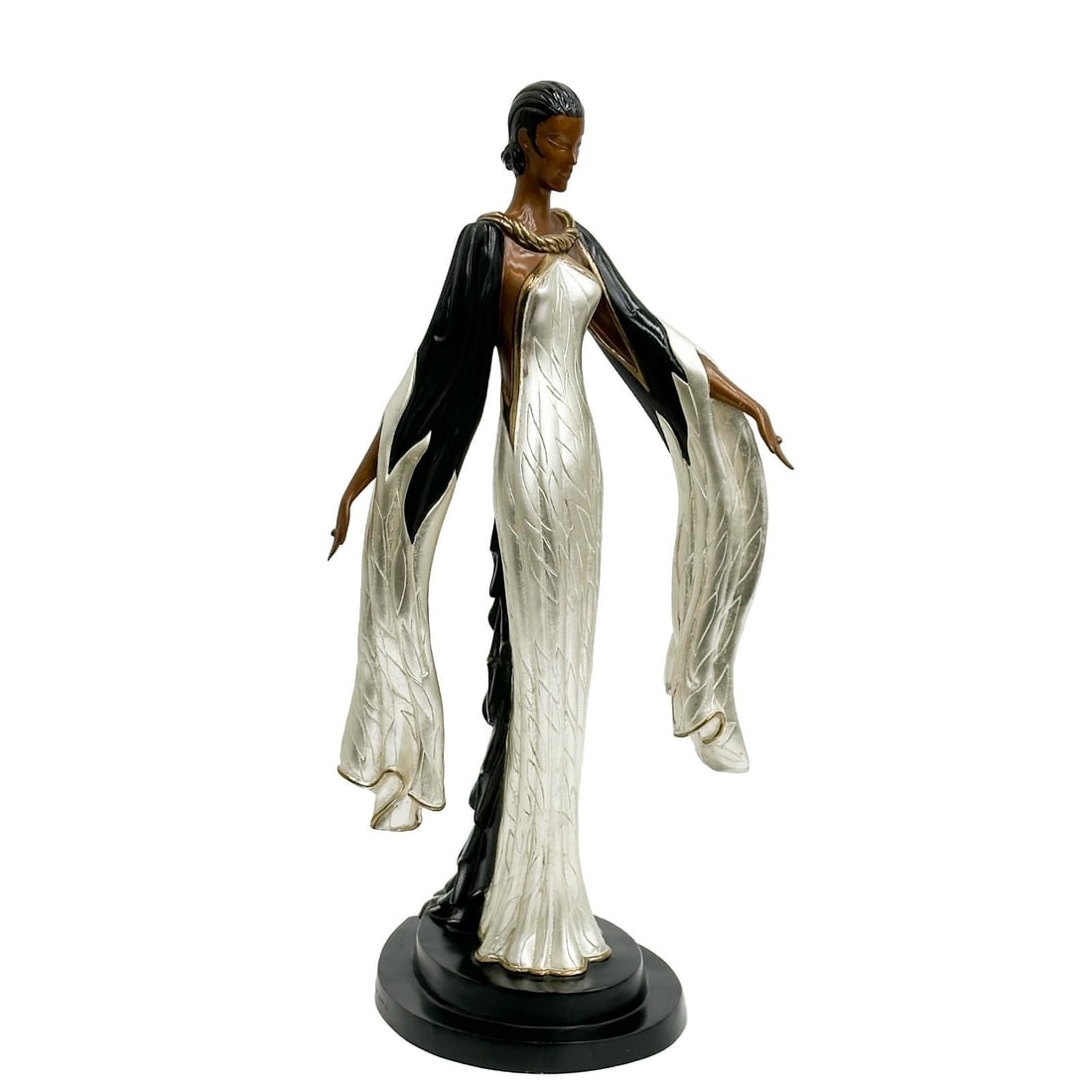 Erte Romain De Tirtoff Bronze Sculpture Fireleaves Ltd Ed/500 Signed: Erté (Romain De Tirtoff) (Russian/French 1892-1990) Patinated, Silvered, and Gilt Bronze Sculpture, "Fireleaves". Depicts a woman wearing a long shawl. Signed to the top edge of the base. Edge number
