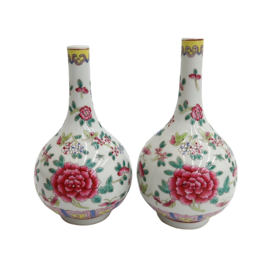 Pair Chinese Porcelain Famille Rose Floral Long Necked Vases Late Qing Dynasty: Pair Chinese Porcelain Famille Rose Floral Long Necked Vases Late Qing Dynasty Weight Approx., 1 lb Measures Approx.,4 inches diameter x 6.825 inches tall Domestic Shipping:$60