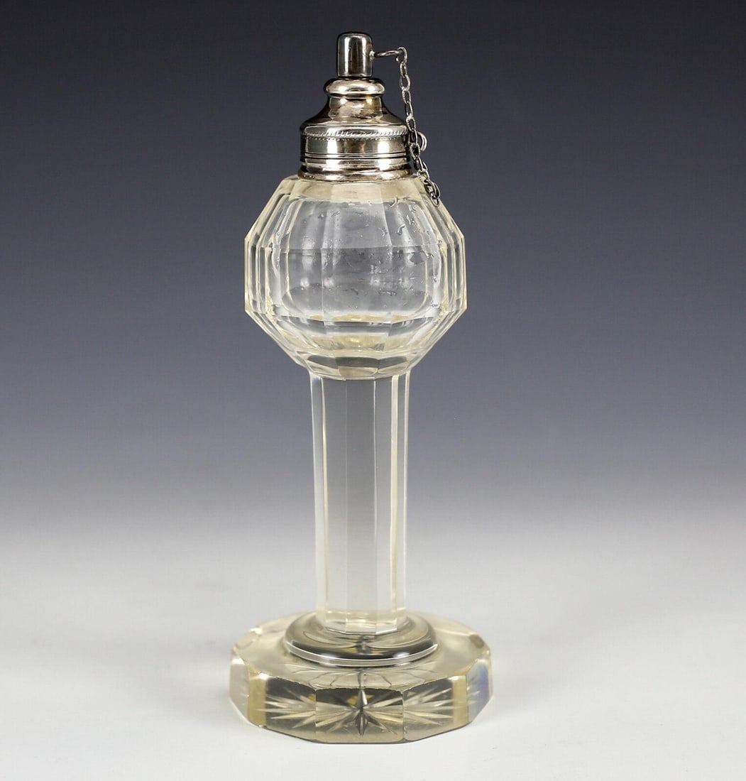 German Crystal & .800 Silver Oil Lamp hand cut faceted form, 19th Century: Singular German Crystal and .800 Silver Oil Lamp, hand cut faceted form with long columnar base. 19th century. Weight:.5lbs Measurements: Approx. 5.625" height Condition: Very good condition, some ver