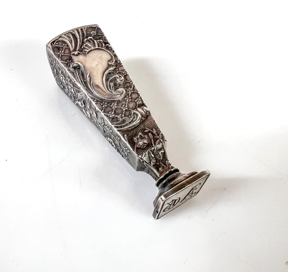 Art Nouveau French 800 Silver Wax Seal repousse floral motifs: French 800 Silver Wax Seal, repousse floral motifs with a vacant cartouche; initials AG. Boar head hallmark on the edge of the stamp; tested silver. Late 19th-early 20th century Measurements: Approx. 