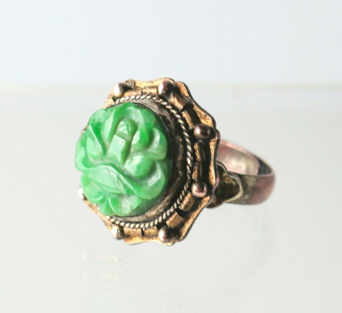 Jade Silver Filigree Rose Gold vermeil Chinese ring Republic period: Hand carved Jade and Silver Filigree Rose Gold vermeil Chinese ring, Republic period. Adjustable, currently size 5, marked 'China'. Measurements: Approx. 5.9grams. Adjustable size Jadeite 12.3mm x 12m