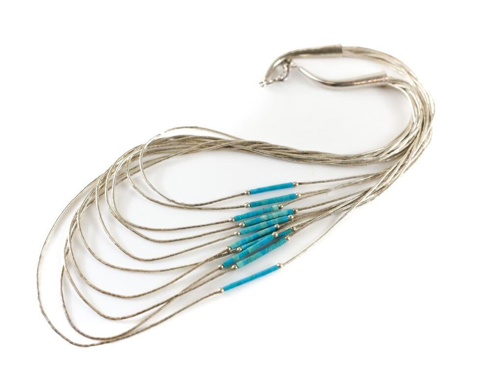 Vtg Navajo Sterling Liquid Silver Necklace Turquoise beads Cascading design: Vintage Navajo Sterling Liquid Silver Necklace with Turquoise beads, cascading design. Marked sterling near hook. 15.3grams Measurements: Approx. 16.5inches length Condition: Great condition, some oxi