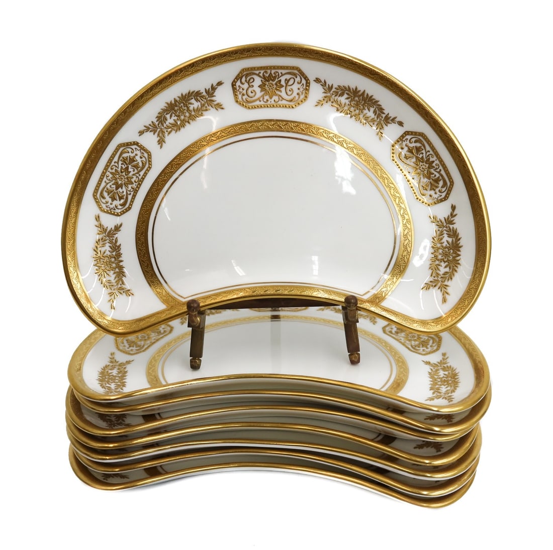 8 Aynsley England Porcelain Crescent Bone Plates in Engagement 8220 c1940: 8 Aynsley England gilt porcelain crescent bone plates in Engagement pattern circa 1940. A white ground with ornate gilt decoration. Subtle "EC" monogram to center . Underside marked Aynsley England 82