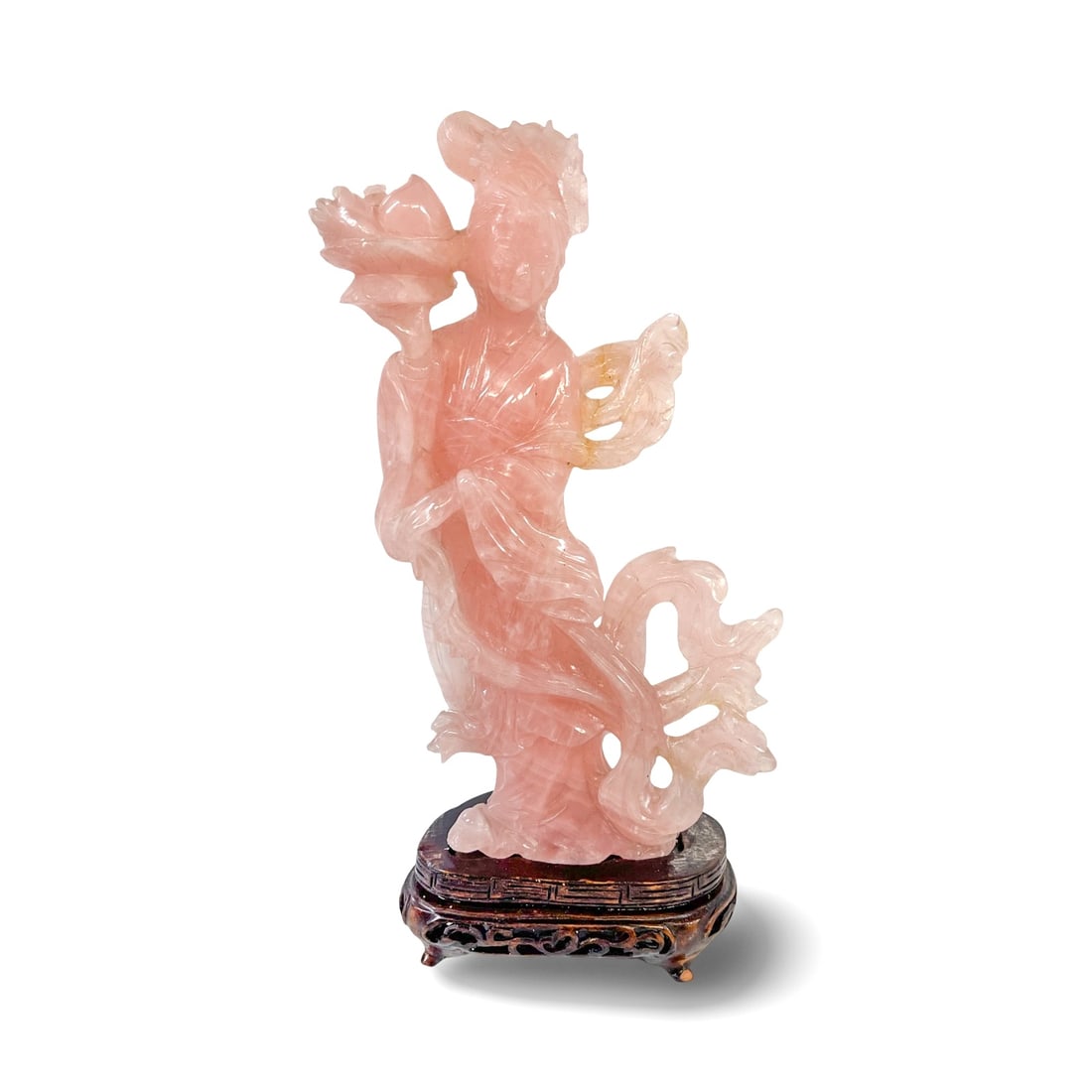 Chinese Hand Carved Rose Quartz Guanyin Figure: Chinese Hand Carved Rose Quartz Guanyin Figure, on carved wood base. Figure holds a bowl holding what appears to be fruit. Flowing robes. Measurements: Approx. quartz figure 8.75 x 5 x 2 inches; 10.5 