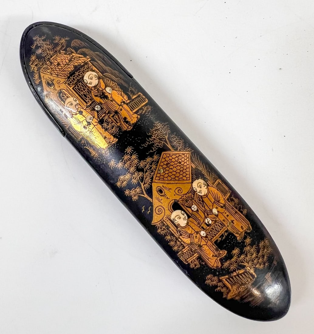 19th Century Japanese Maki-e lacquered papier mache Eyeglass spectacle case: 19th Century Japanese Maki-e lacquered papier-mâché Eyeglass / spectacle case, with velvet lining. Gold-painted and off-white-detailed figures, pavilions, and pine or bamboo foliage against a black 