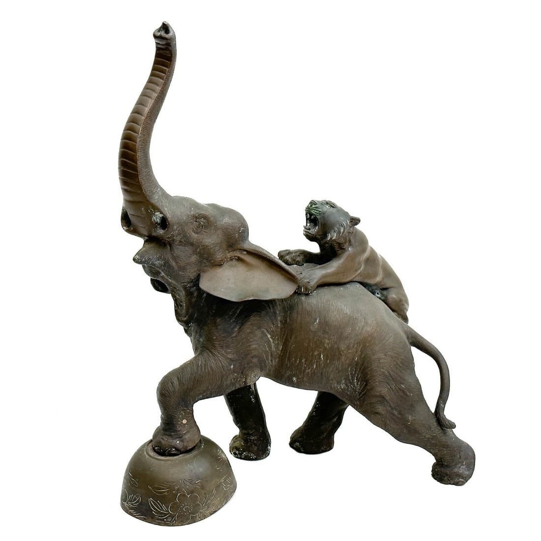 Genryusai Seiya Japanese Bronze Okimono Sculpture Elephant & Tiger Meiji Period: Genryusai Seiya ??? Japanese Bronze Sculpture Okimono Elephant and Tiger. Sculpture depicts a tiger on the back of an elephant. Underside marked ??? Work of Seiya Weight: Approx. 10 lbs Measurements: 