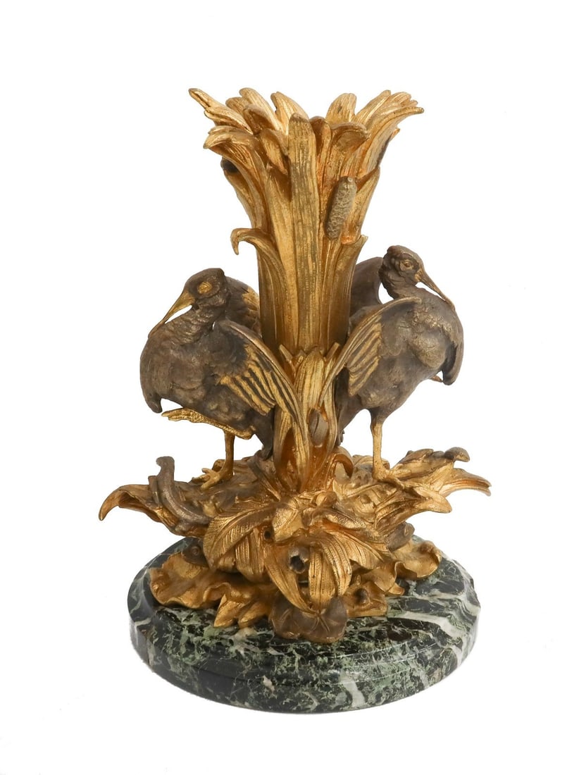 French Gilt Bronze Figural Wading Birds and Leaf Vase on Marble Base circa 1900: French gilt bronze figural wading birds and leaf vase, circa 1900. The vase depicts a two figural birds- possibly ibises or snapes perched on gilt leaves throughout. Mounted to a green marble round ba