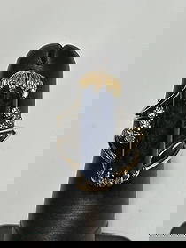 Blue Sodalite and Diamond Ring, Size 4.5: A sculptural composition of elegance and color, this Midnight Crest ring is fashioned in 14K yellow gold and has a total weight of approximately 7.9 grams. The design centers on a tall, polished blue