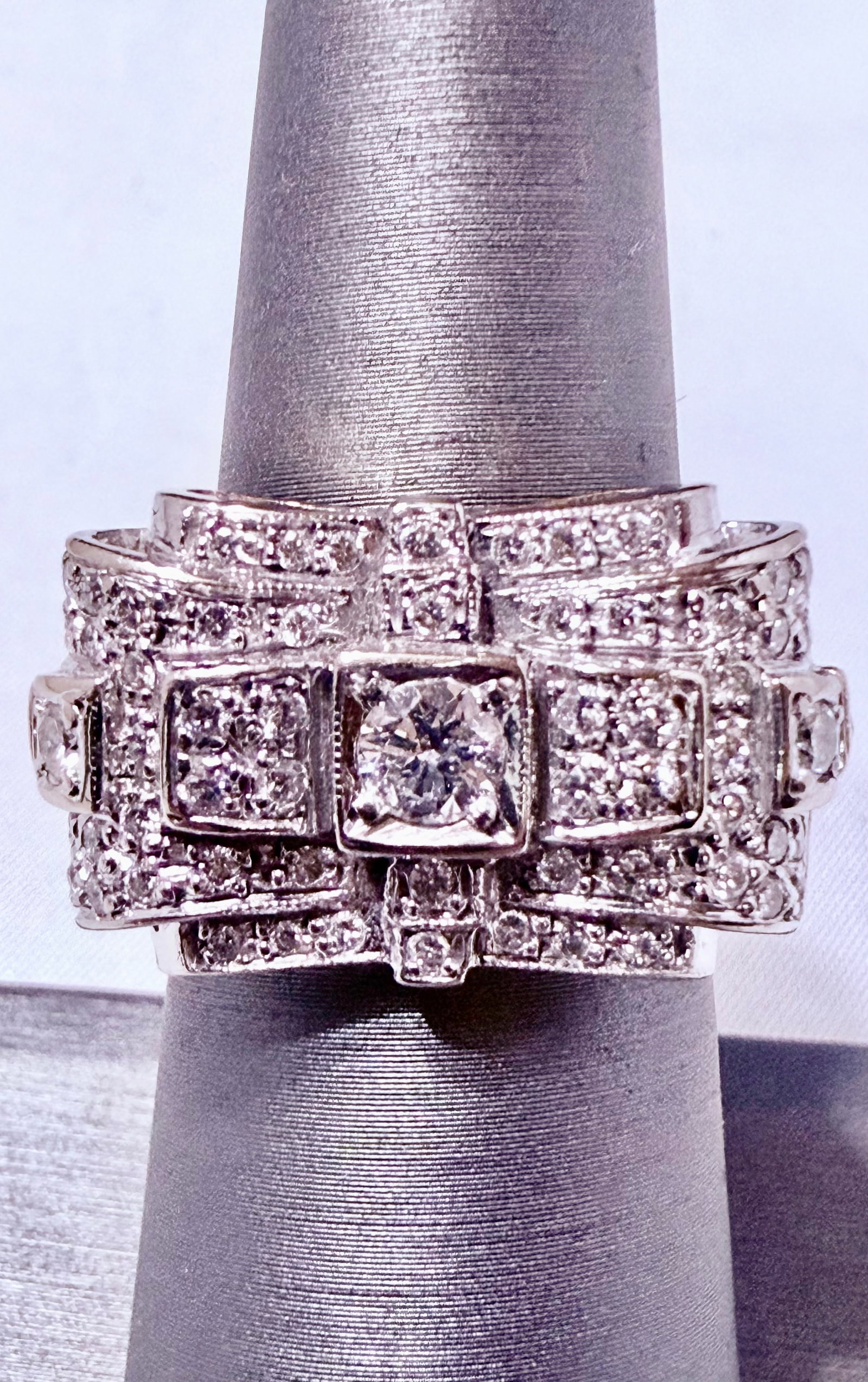 14K Yellow Gold Cluster Diamond Ring Size 6 1/2: Commanding in presence and richly detailed, this 14K yellow gold vintage diamond cluster ring showcases the architectural geometry and bold opulence of mid-century design. The wide, stepped band featu