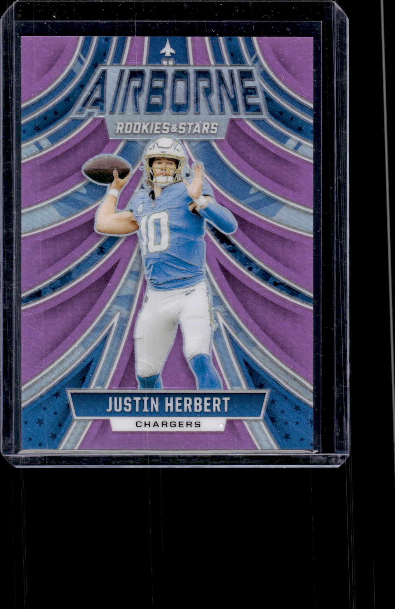 Justin Herbert Airborne Pink Prizm /75 2024 Panini Rookies & Stars #A-JHT (1 of 2)