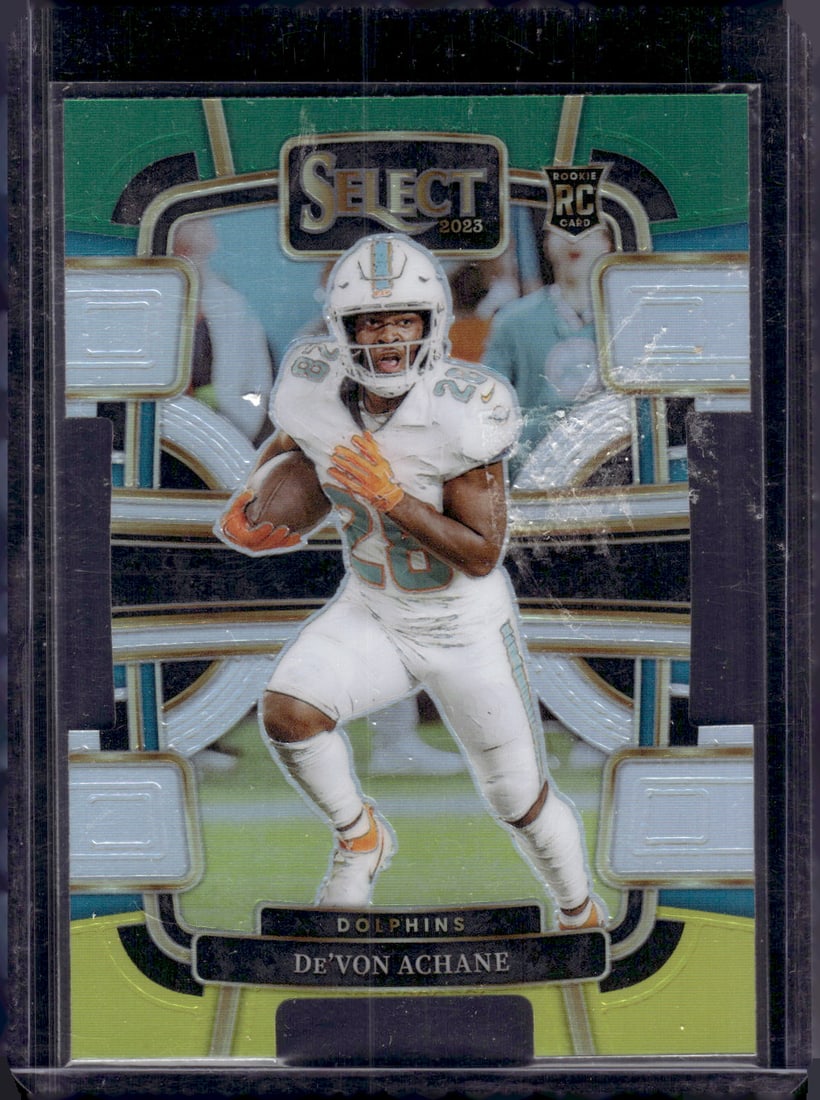 De'Von Achane Rookie Card Green/Yellow Prizm Die Cut 2023 Panini Select #63 Dolphins: Panini Select, Prizm, Mosaic, Contenders, Zenith, Phoenix, Illusions, Absolute, Rookie NFL Sports Trading Cards, SP, SSP, Cards, Football Cards for Sale Near Me, Superbowl & Hall of Fame Player Cards,
