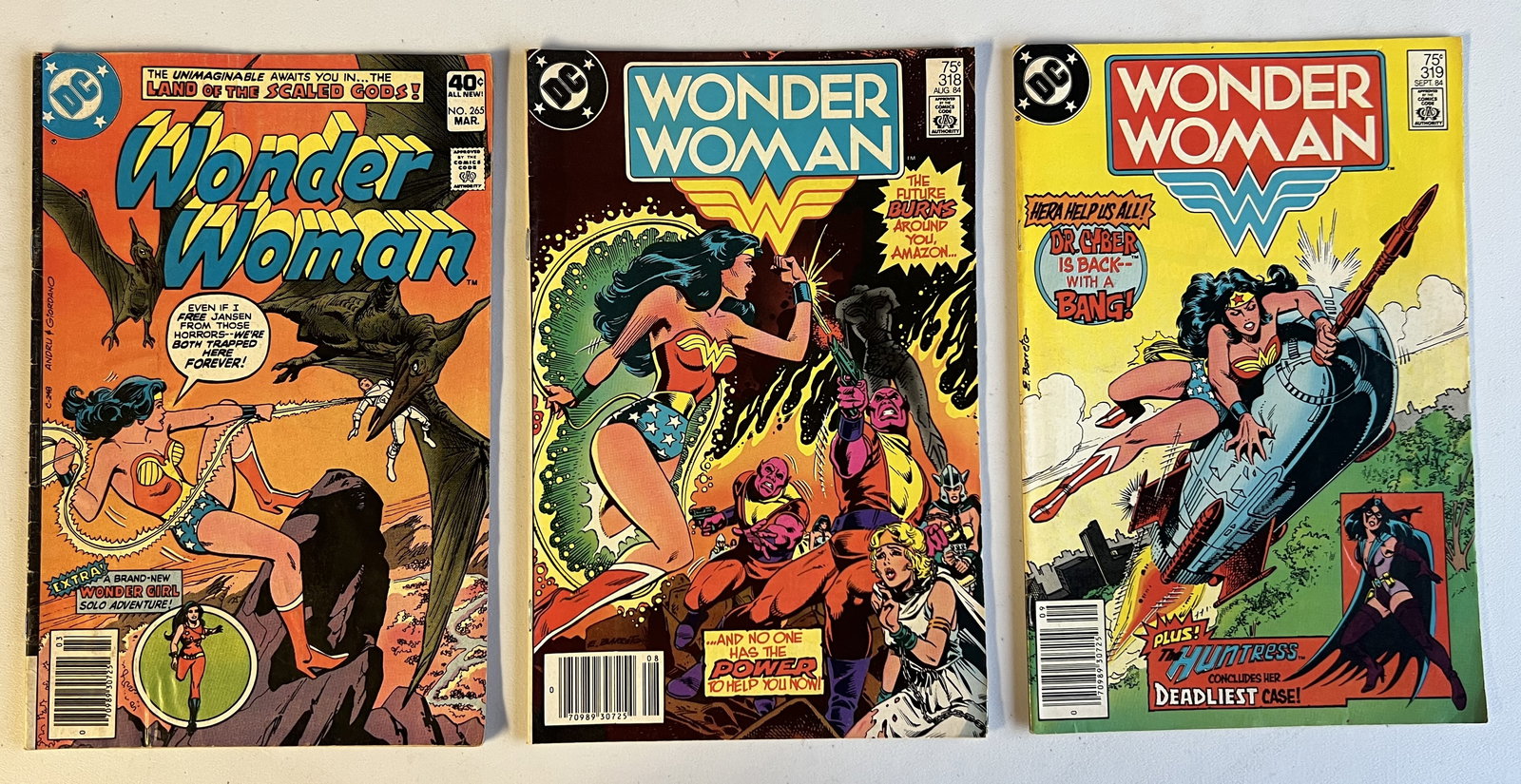 3 Wonder Woman Vintage DC Comic Books: 1980 #265 vs Dinosaurs & 1984 #318 & 319 Dr. Cyber (1 of 3)