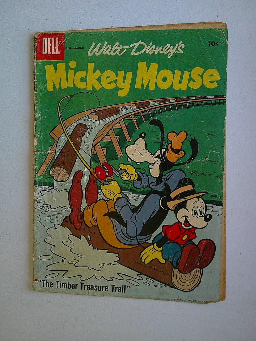 Walt Disney's Mickey Mouse Vintage Silver Age Comic Book: 1958 #58 Cover Seperated from Intact Book: Cover Seperated from an intact book. Back cover has a piece missing. All Comic Books come Bagged, Boarded, and Sleeved in a Hard PVC Top Loader, Shipping is a little more than baseball cards due to th
