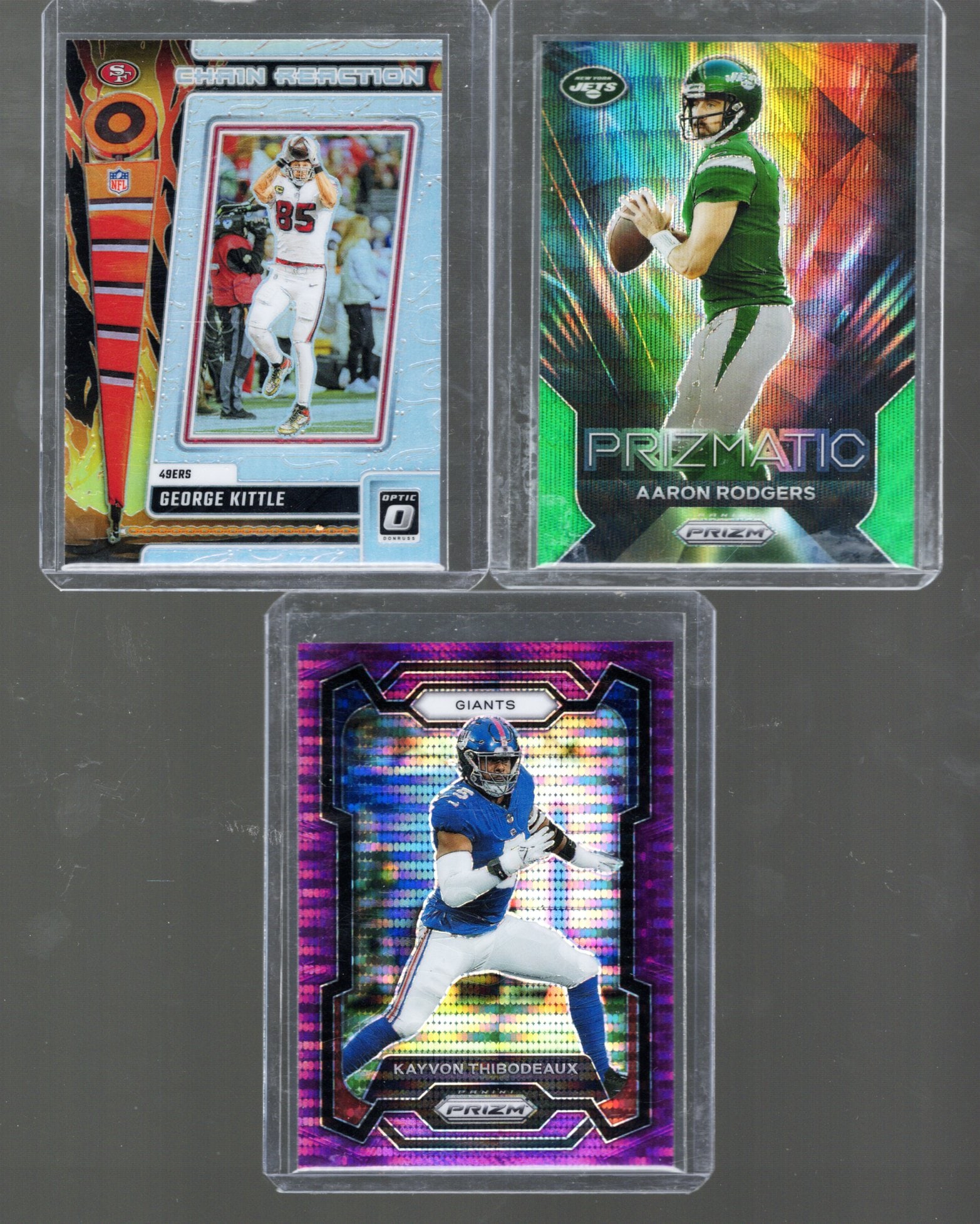 Aaron Rodgers Green Prizm, George Kittle Silver Holo Prizm, Purple Wave Kayvon Thibodeaux (1 of 2)
