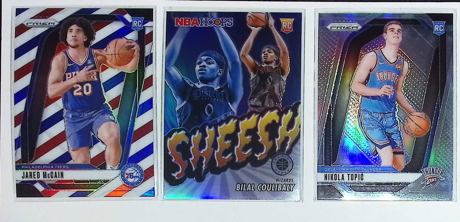 Jared McCain Rookie Card Red, White, & Blue Prizm, Bilal Coulibaly Sheesh Silver Prizm, & Nikola (1 of 2)