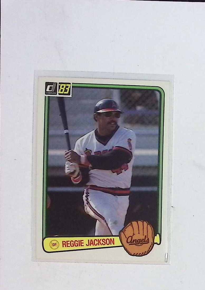 Reggie Jackson 1983 Donruss #115 Vintage MLB Trading Card Mr. October: Panini Select, Prizm, Mosaic, Contenders, Revolution, Phoenix, NBA Hoops, Rookie NFL Sports Trading Cards, Silver, SP, SSP, Wave Prizms, Numbered Cards, Basketball sports Cards for Sale Near Me, NBA C