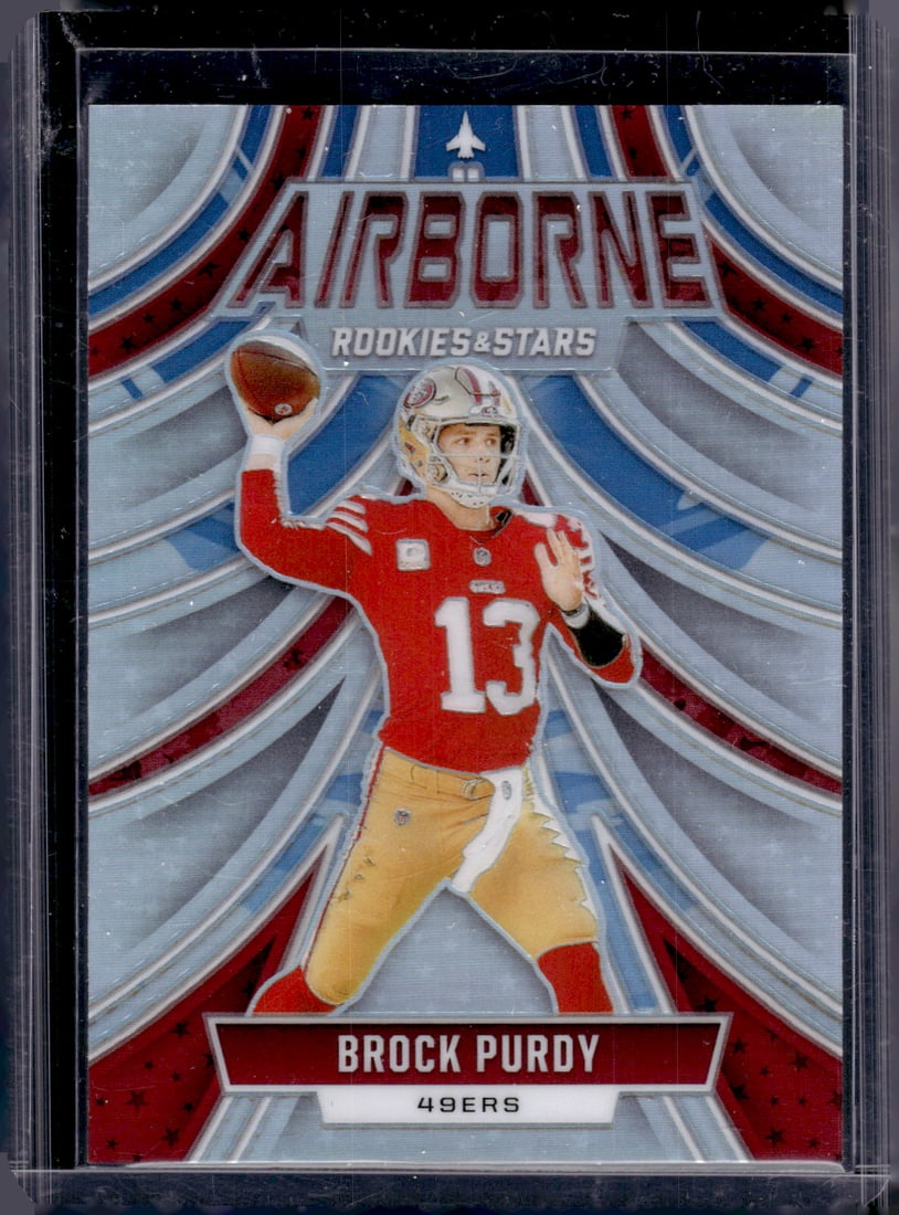 Brock Purdy Airborne Silver Prizm 2024 Rookies & Stars #A-BPY San Francisco 49ers (1 of 2)