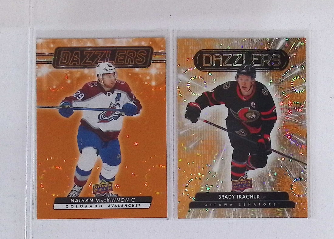 Brady Tkachuk & Nathan McKinnon Orange Dazzlers 2022 & 2023 Upper Deck (1 of 2)