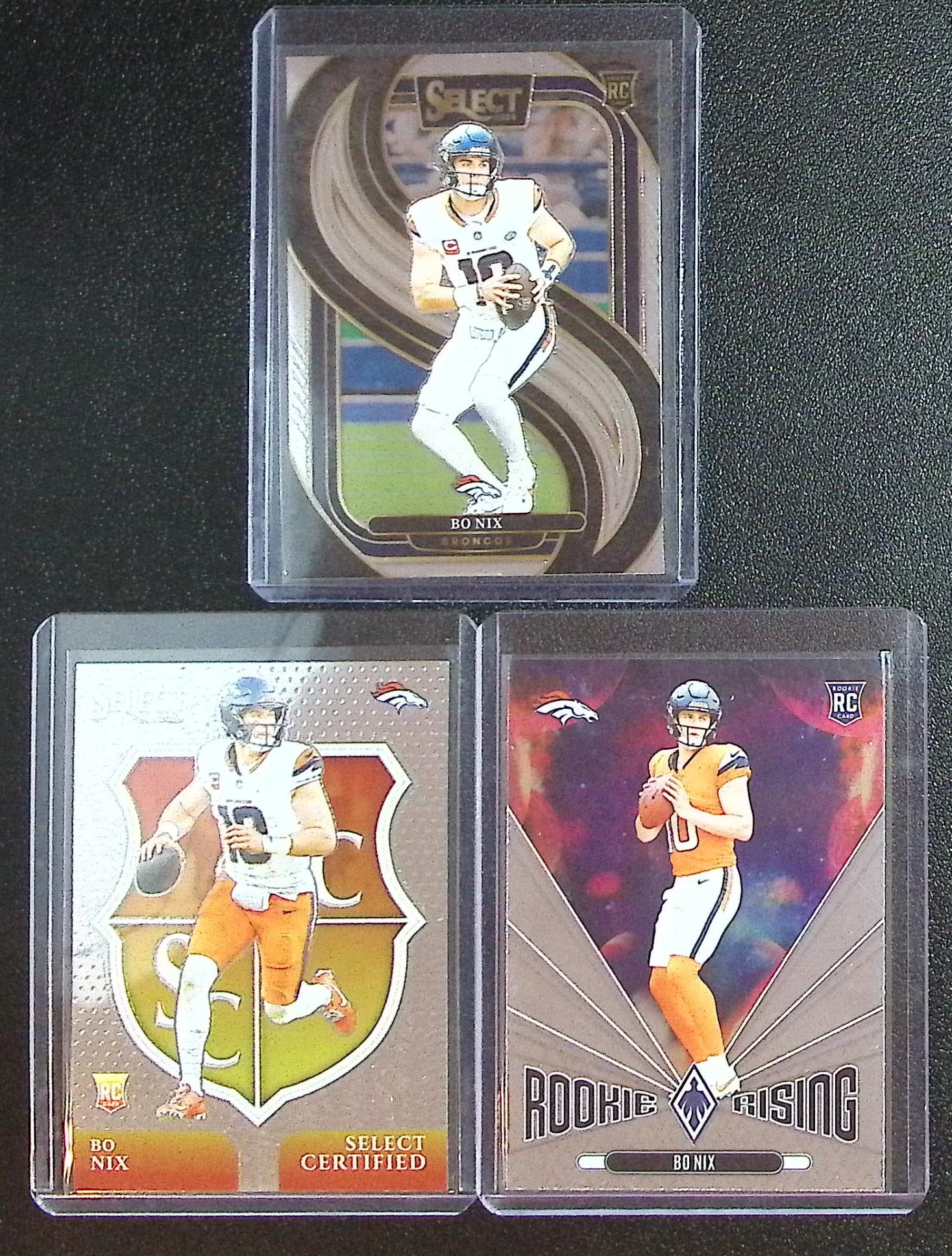 Lot of 3 Bo Nix Rookie Cards. All Panini, All Different, See Pictures. Denver Broncos: Panini Select, Prizm, Mosaic, Contenders, Zenith, Phoenix, Illusions, Absolute, Rookie NFL Sports Trading Cards, SP, SSP, Cards, Football Cards for Sale Near Me, Superbowl & Hall of Fame Player Cards,