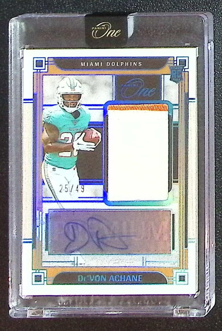 De'Von Achane Rookie Patch Auto /49 2023 Panini One #141 Miami Dolphins: Panini Select, Prizm, Mosaic, Contenders, Zenith, Phoenix, Illusions, Absolute, Rookie NFL Sports Trading Cards, SP, SSP, Cards, Football Cards for Sale Near Me, Superbowl & Hall of Fame Player Cards,