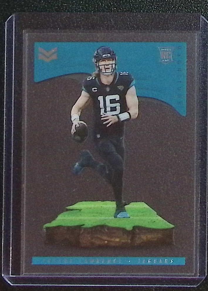 Trevor Lawrence Rookie Card Acetate 2021 Chornicles Stars & Stripes #MAG-1 Jaguars: Panini Select, Prizm, Mosaic, Contenders, Zenith, Phoenix, Illusions, Absolute, Rookie NFL Sports Trading Cards, SP, SSP, Cards, Football Cards for Sale Near Me, Superbowl & Hall of Fame Player Cards,