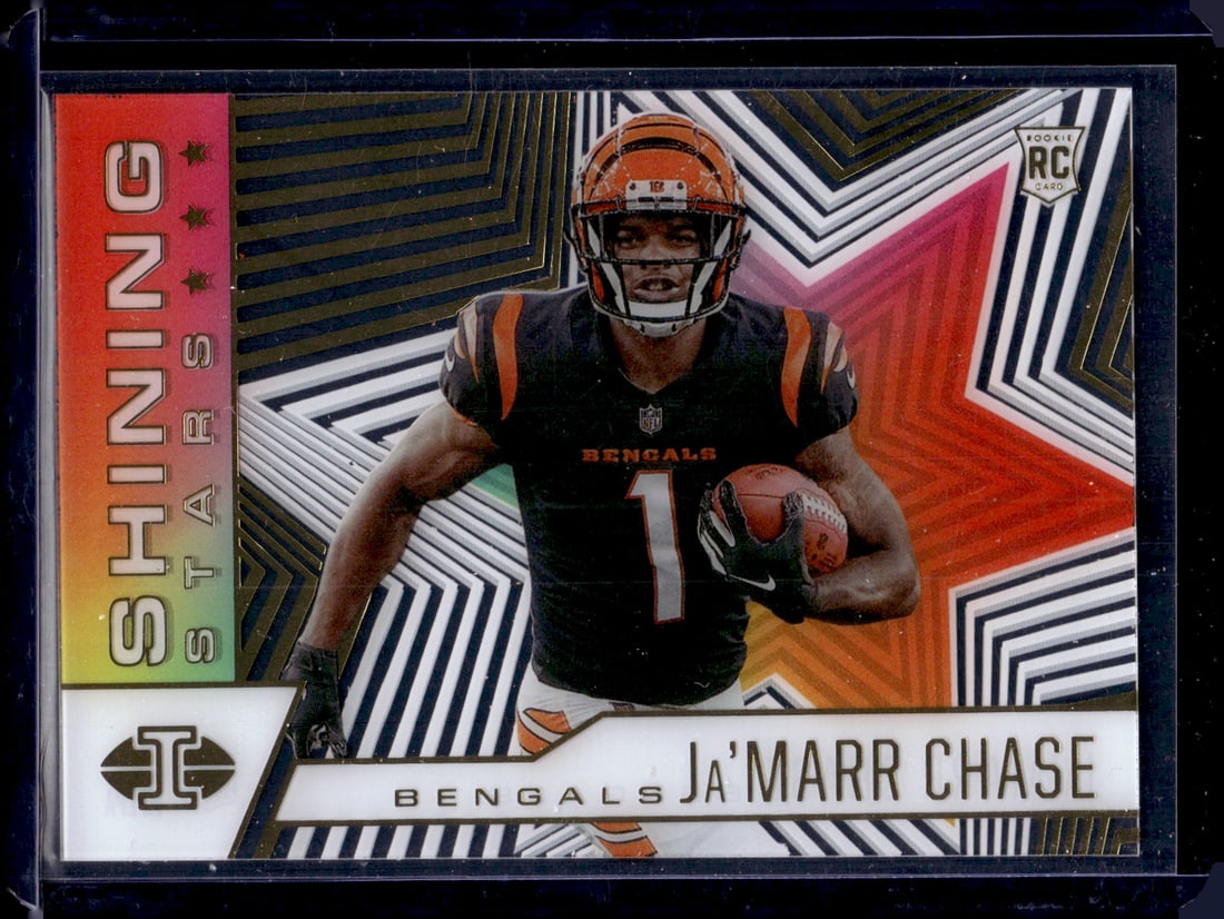 Ja'Marr Chase Rookie Card Shining Stars Acetate 2021 Panini Illusions #SS-17 Bengals: Panini Select, Prizm, Mosaic, Contenders, Revolution, Phoenix, NBA Hoops, Rookie NFL Sports Trading Cards, Silver, SP, SSP, Wave Prizms, Numbered Cards, Basketball sports Cards for Sale Near Me, NBA C