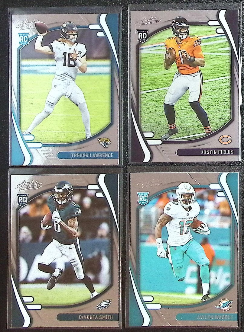 Lot of 4 2021 Absolute Football Rookie Cards. Lawrence, Fields, Smith, Waddle (1 of 2)