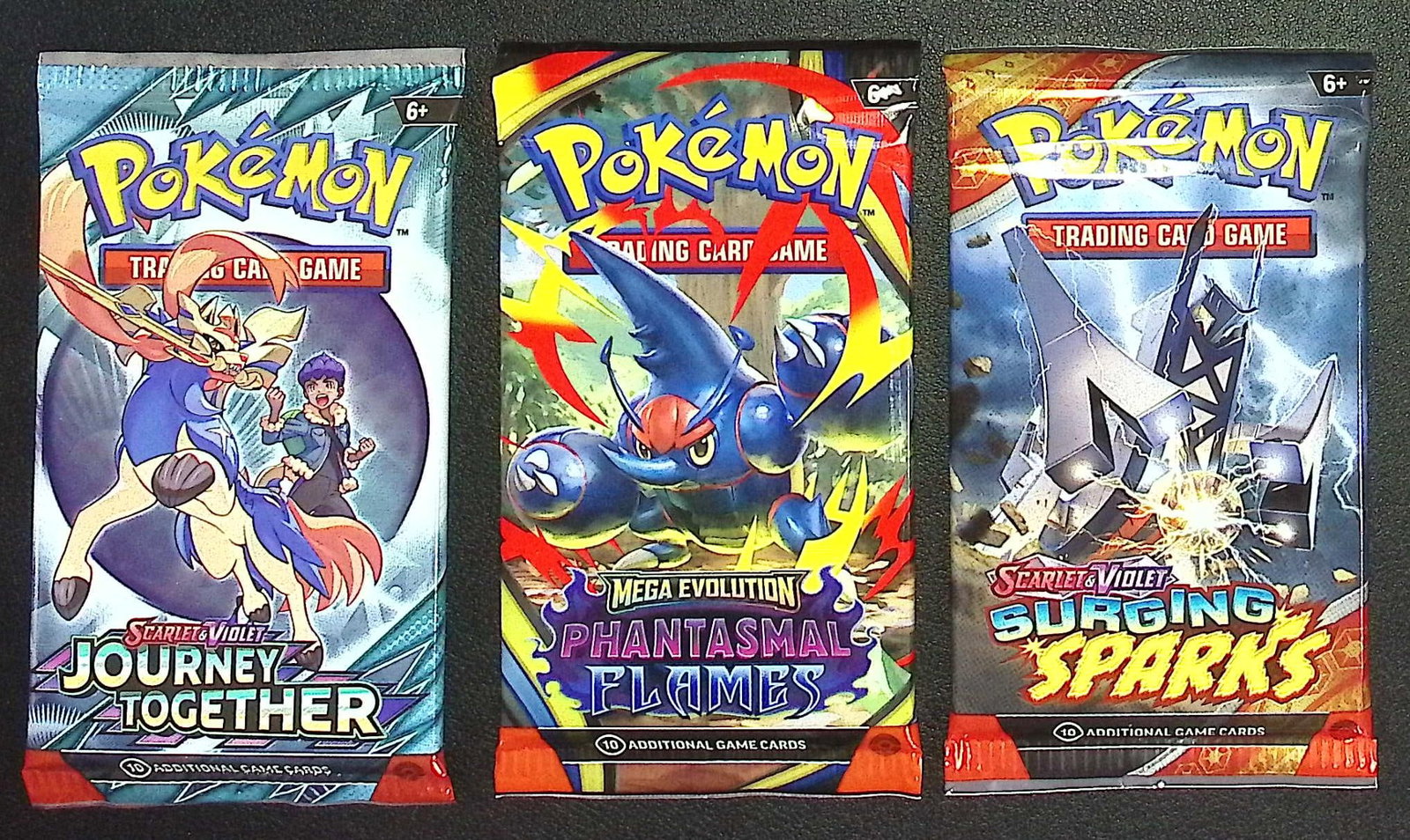 3 COUNT: 1 - Pokemon Journey Together, 1 - Phantasmal Flames, & 1 - Surging Sparks Booster Packs: Pokemon Trading Card Game Cards, Charizard, Pikachu, Mewto, EX, Referse Holo, Holo Rare Cards, Secret Rare Cards, Full Art Cards, Evee, 3 Stars Ultra Rare Cards, Double Rare, Illustration Rare, Specia