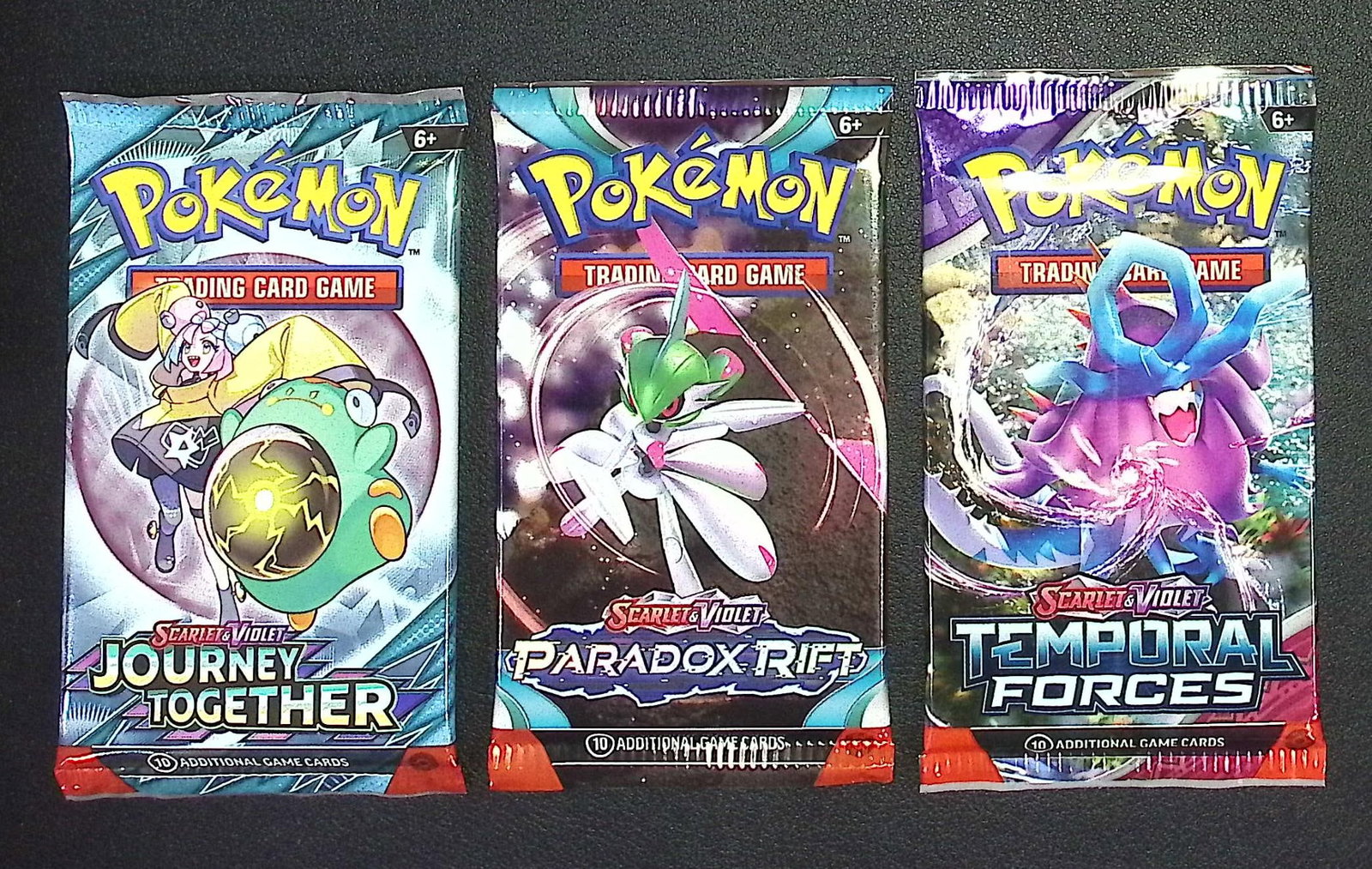 3 COUNT: 1 - Pokemon Journey Together, 1 - Paradox Rift, & 1 - Temporal Forces Booster Packs: Pokemon Trading Card Game Cards, Charizard, Pikachu, Mewto, EX, Referse Holo, Holo Rare Cards, Secret Rare Cards, Full Art Cards, Evee, 3 Stars Ultra Rare Cards, Double Rare, Illustration Rare, Specia