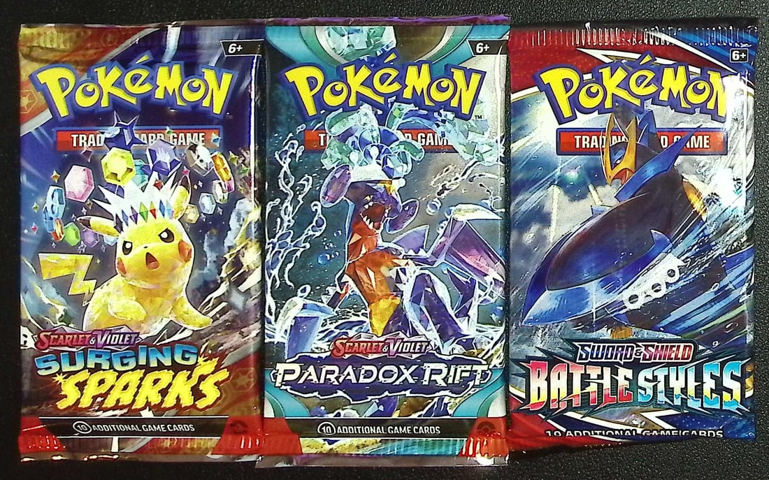 3 COUNT: 1 - Pokemon Battle Styles, 1 - Paradox Rift, & 1 - Surging Sparks Booster Packs: Pokemon Trading Card Game Cards, Charizard, Pikachu, Mewto, EX, Referse Holo, Holo Rare Cards, Secret Rare Cards, Full Art Cards, Evee, 3 Stars Ultra Rare Cards, Double Rare, Illustration Rare, Specia