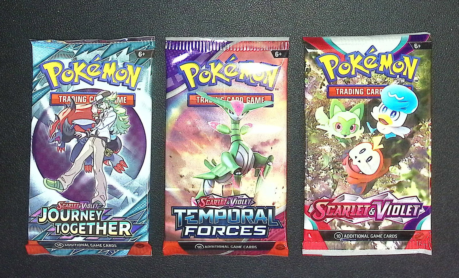 3 COUNT: 1 - Pokemon Temporal Forces, 1 -Scarlet & Violet, & 1 - Journey Together Booster Packs: Pokemon Trading Card Game Cards, Charizard, Pikachu, Mewto, EX, Referse Holo, Holo Rare Cards, Secret Rare Cards, Full Art Cards, Evee, 3 Stars Ultra Rare Cards, Double Rare, Illustration Rare, Specia