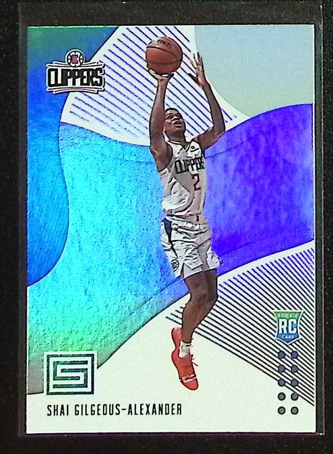 Shai Gilgeous-Alexander Rookie Card 2018-19 Panini Status #106 Clippers, Thunder: Panini Select, Prizm, Mosaic, Contenders, Revolution, Phoenix, NBA Hoops, Rookie NFL Sports Trading Cards, Silver, SP, SSP, Wave Prizms, Numbered Cards, Basketball sports Cards for Sale Near Me, NBA C
