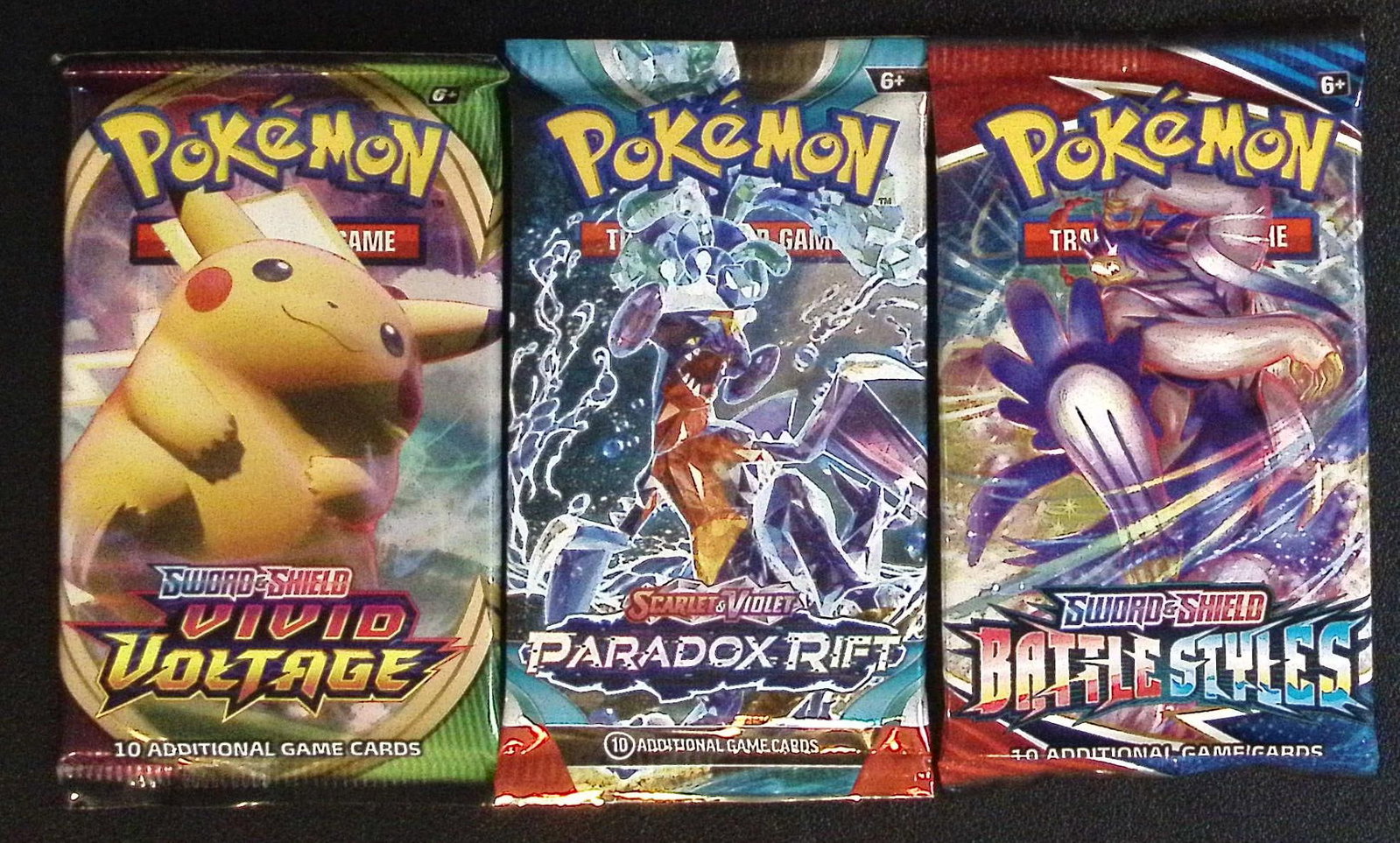 3 COUNT: 1 - Pokemon Battle Styles, 1 - Paradox Rift, & 1 - Vivid Voltage Booster Packs (1 of 1)
