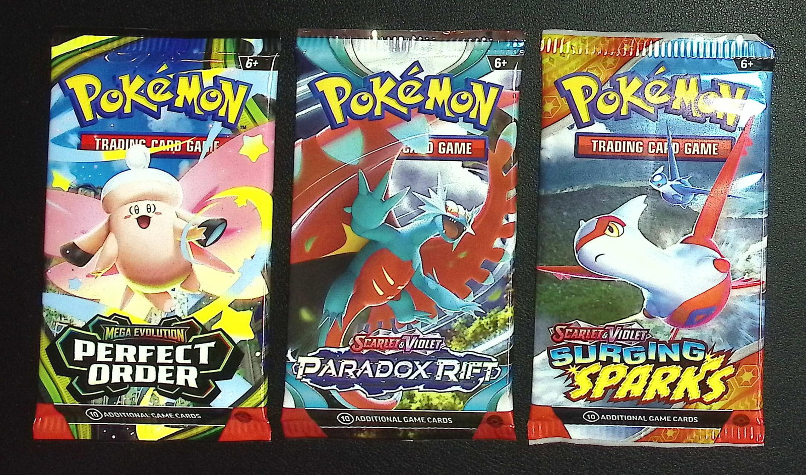 3 COUNT: 1 - Pokemon Perfect Order, 1 - Paradox Rift, & 1 - Surging Sparks Booster Packs (1 of 1)