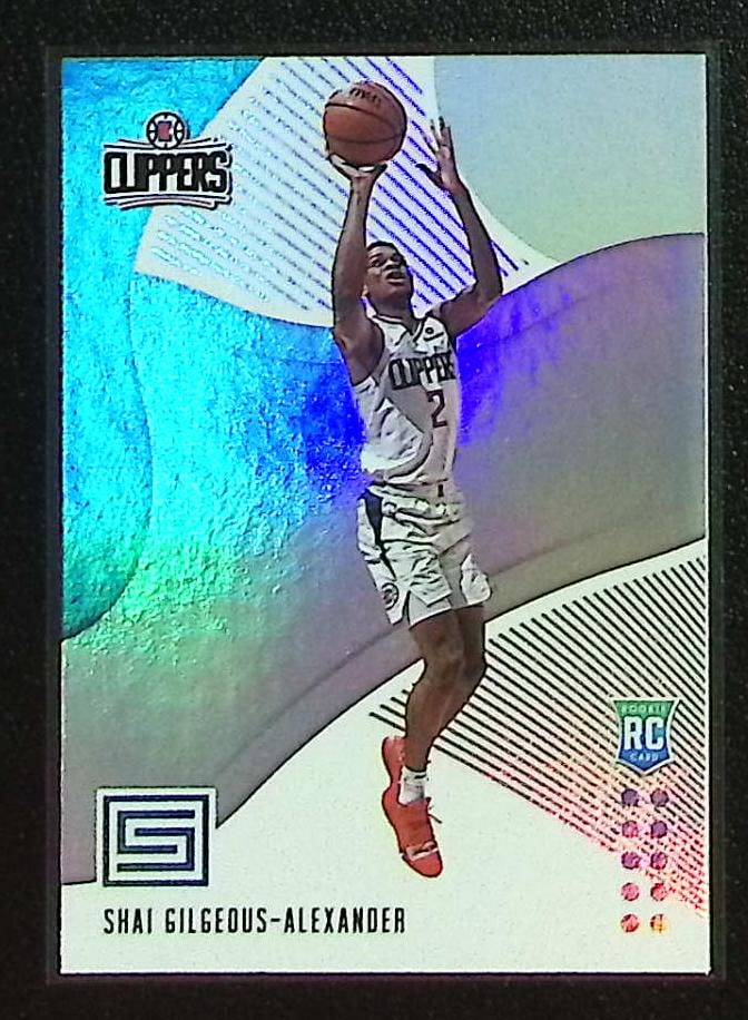 Shai Gilgeous-Alexander Rookie Card 2018-19 Panini Status #106 Clippers, Thunder: Panini Select, Prizm, Mosaic, Contenders, Revolution, Phoenix, NBA Hoops, Rookie NFL Sports Trading Cards, Silver, SP, SSP, Wave Prizms, Numbered Cards, Basketball sports Cards for Sale Near Me, NBA C