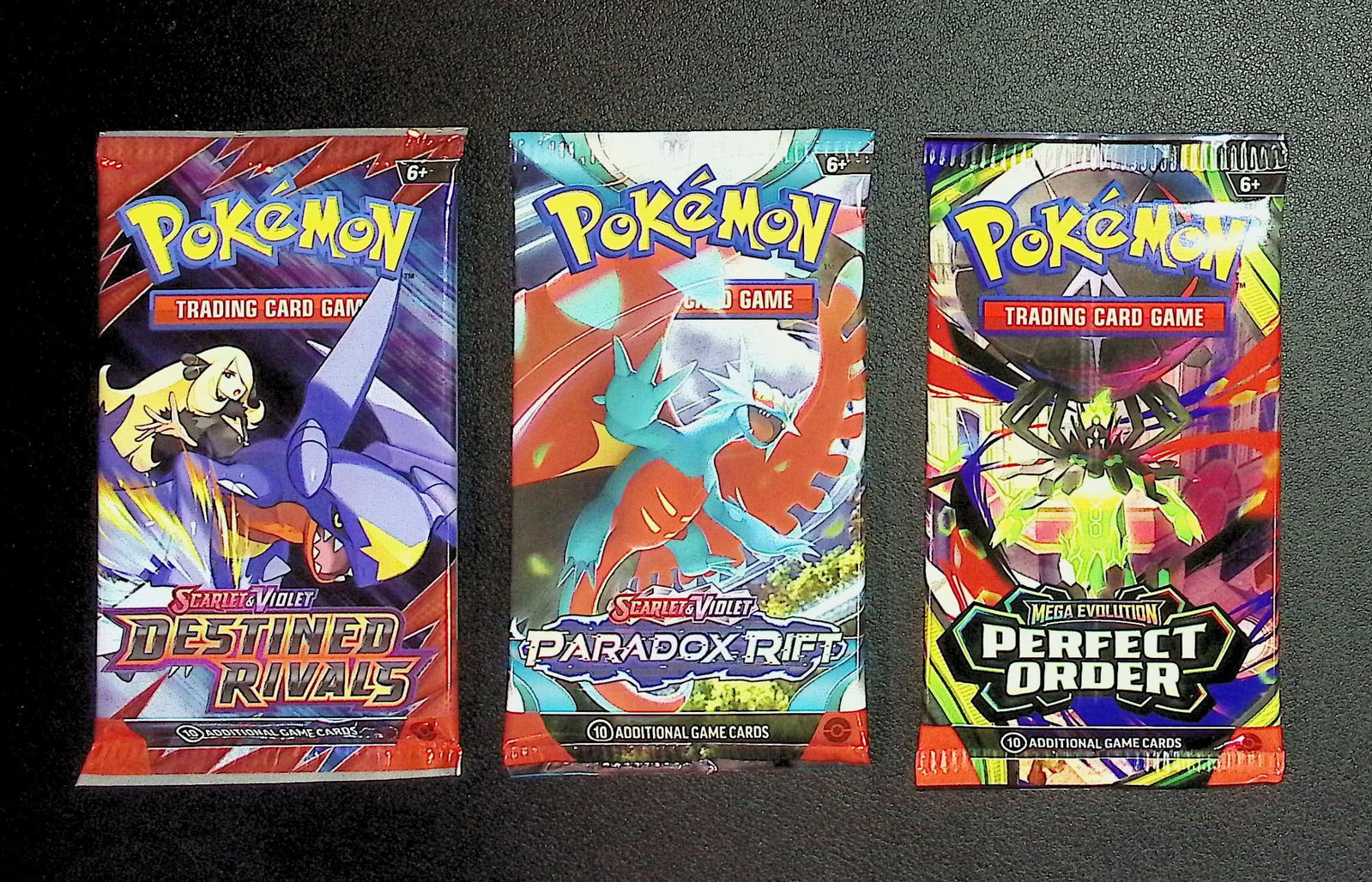 3 COUNT: 1 - Pokemon Destined Rivals, 1 - Paradox Rift, & 1 - Surging Sparks Booster Packs: Pokemon Trading Card Game Cards, Charizard, Pikachu, Mewto, EX, Referse Holo, Holo Rare Cards, Secret Rare Cards, Full Art Cards, Evee, 3 Stars Ultra Rare Cards, Double Rare, Illustration Rare, Specia