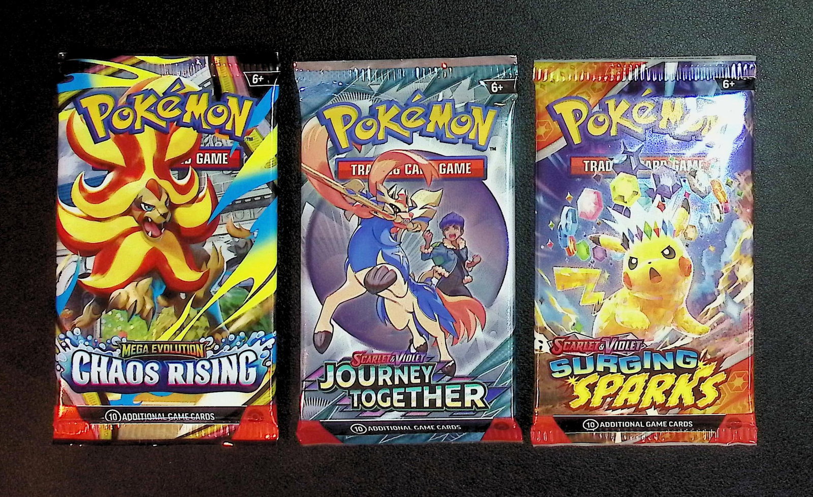 3 COUNT: 1 - Pokemon Chaos Rising, 1 - Journey Together, 1 - Surging Sparks Booster Packs (1 of 1)