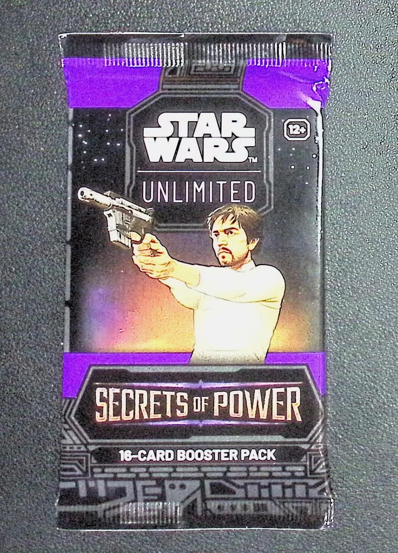 Star Wars Unlimited Secrets of Power 16 Card Booster Pack: 1 Rare or Legendary per Pack: Disney TCG, Trading Card Games, 1 Leader, 1 Base/Token, 9 Commons, 3 Uncommon, 1 Rare or Legendary, & 1 Premium Foil Card Per Pack. Darth Vader, Luke Skywalker, Princess Leia, Mandalorian, Yoda, Grogu