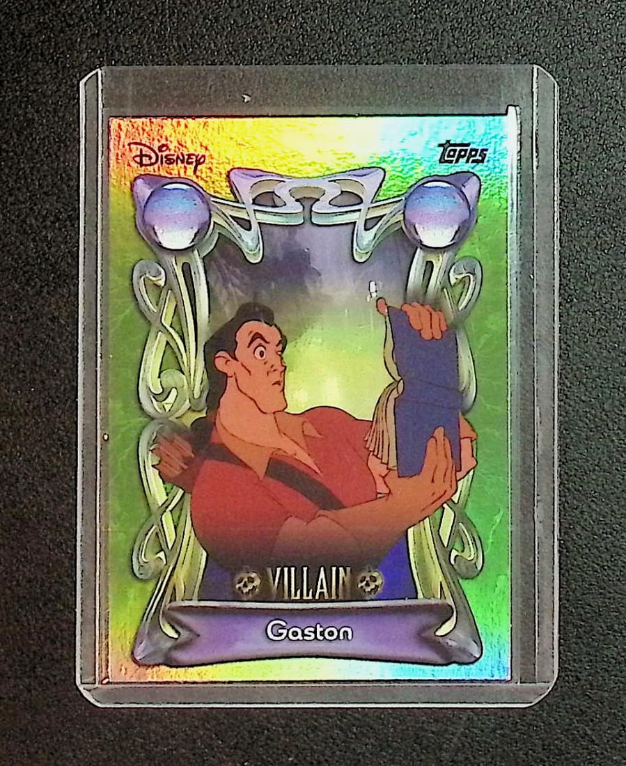 Gaston Disney Villian Refractor 2025 Topps #177: Disney Topps Trading Cards of Movies & Television Shows, Refractors, Ray Waves, Numbered Rare Cards. Darth Vader, Luke Skywalker, Princess Leia, Mandalorian, Yoda, Grogu, Han Solo, Rebellion, Imperial