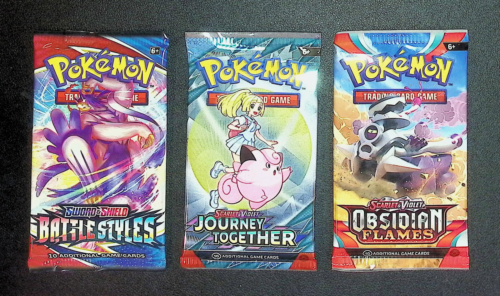 3 COUNT: 1 - Pokemon Battle Styles, 1 - Journey Together, & 1 - Obsidian Flames Booster Packs: Pokemon Trading Card Game Cards, Charizard, Pikachu, Mewto, EX, Referse Holo, Holo Rare Cards, Secret Rare Cards, Full Art Cards, Evee, 3 Stars Ultra Rare Cards, Double Rare, Illustration Rare, Specia