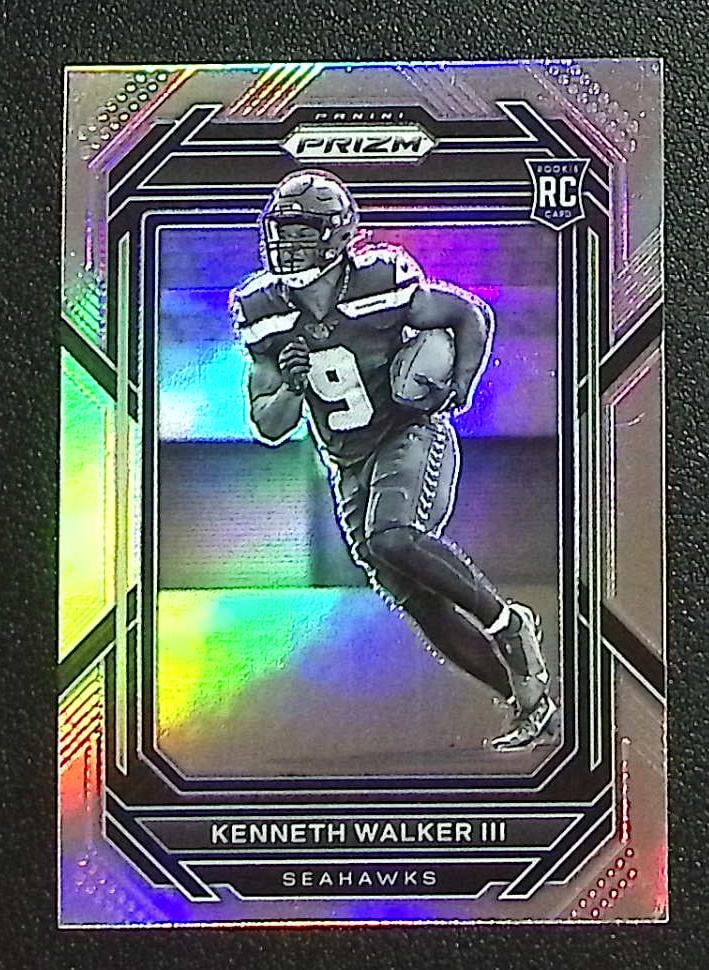 Kenneth Walker Rookie Card Negative Variation Prizm 2022 Panini Prizm #318: Panini Select, Prizm, Mosaic, Contenders, Zenith, Phoenix, Illusions, Absolute, Rookie NFL Sports Trading Cards, SP, SSP, Cards, Football Cards for Sale Near Me, Superbowl & Hall of Fame Player Cards,