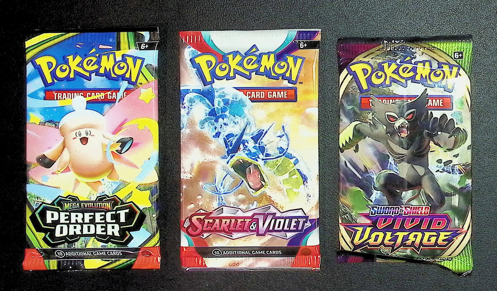 3 COUNT: 1 - Pokemon Perfect Order, 1 - Scarlet & Violet, & 1 - Vivid Voltage Booster Packs: Pokemon Trading Card Game Cards, Charizard, Pikachu, Mewto, EX, Referse Holo, Holo Rare Cards, Secret Rare Cards, Full Art Cards, Evee, 3 Stars Ultra Rare Cards, Double Rare, Illustration Rare, Specia