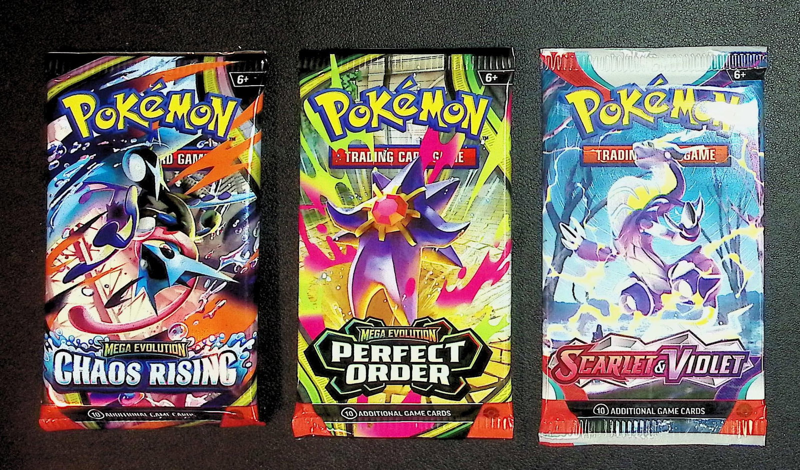 3 COUNT: 1 - Pokemon Chaos Rising, 1 - Perfect Order, 1 - Scarlet & Violet Booster Packs: Pokemon Trading Card Game Cards, Charizard, Pikachu, Mewto, EX, Referse Holo, Holo Rare Cards, Secret Rare Cards, Full Art Cards, Evee, 3 Stars Ultra Rare Cards, Double Rare, Illustration Rare, Specia