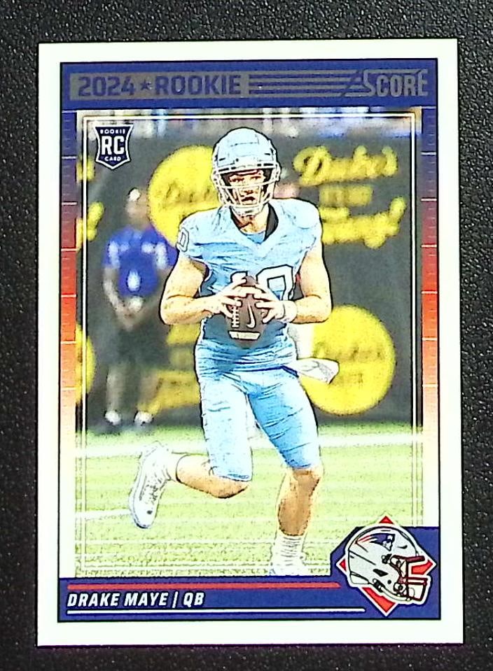 Drake Maye Rookie Card 2024 Panini Score #303 New England Patriots: Panini Select, Prizm, Mosaic, Contenders, Zenith, Phoenix, Illusions, Absolute, Rookie NFL Sports Trading Cards, SP, SSP, Cards, Football Cards for Sale Near Me, Superbowl & Hall of Fame Player Cards,