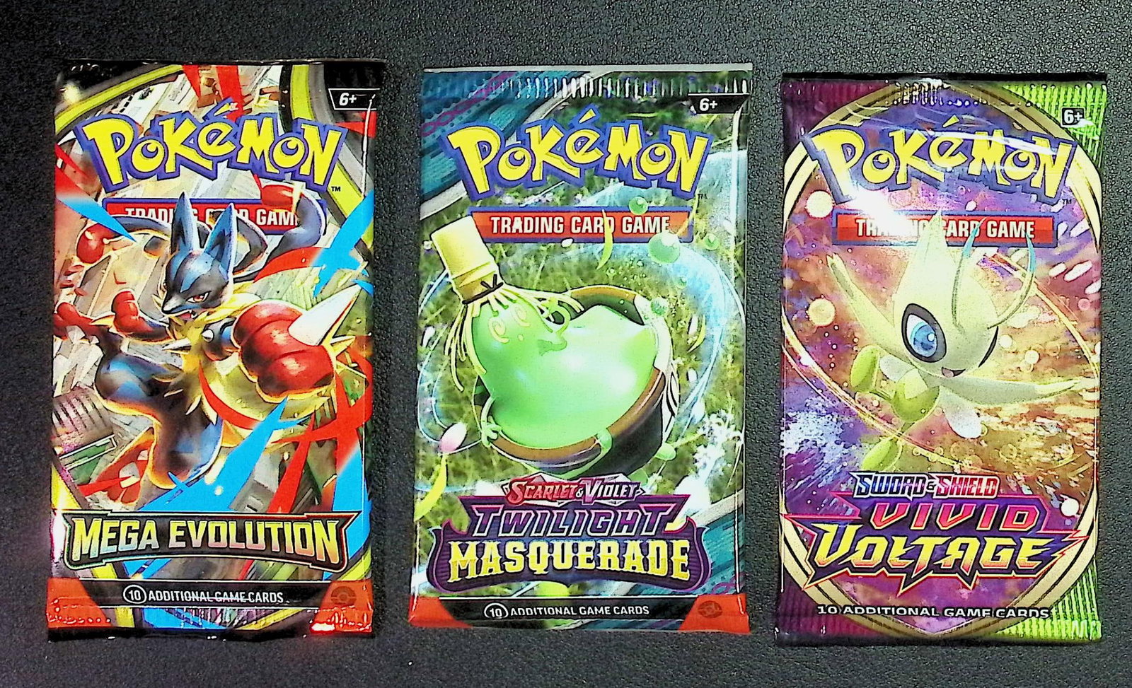 3 COUNT: 1 - Pokemon Mega Evolution, 1 - Twilight Masquerade, 1 - Vivid Voltage Booster Packs: Pokemon Trading Card Game Cards, Charizard, Pikachu, Mewto, EX, Referse Holo, Holo Rare Cards, Secret Rare Cards, Full Art Cards, Evee, 3 Stars Ultra Rare Cards, Double Rare, Illustration Rare, Specia