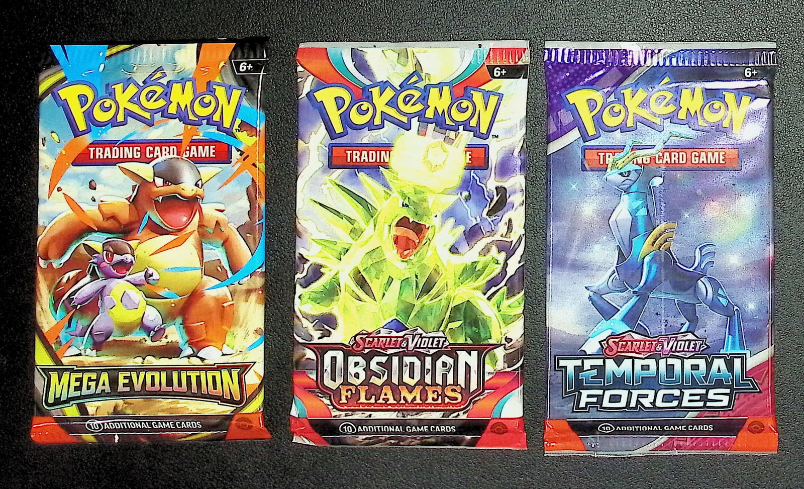 3 COUNT: 1 - Pokemon Mega Evolution, 1 - Obsidian Flames, & 1 - Temporal Forces Booster Packs: Pokemon Trading Card Game Cards, Charizard, Pikachu, Mewto, EX, Referse Holo, Holo Rare Cards, Secret Rare Cards, Full Art Cards, Evee, 3 Stars Ultra Rare Cards, Double Rare, Illustration Rare, Specia